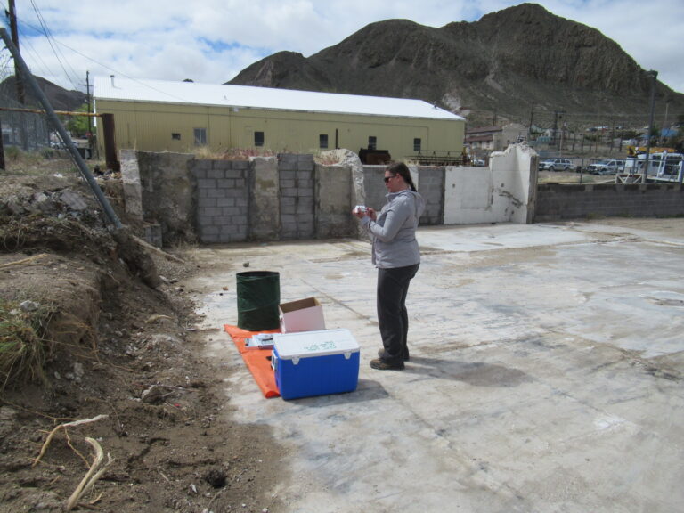 BEC Environmental Scientist labeling a soil sample taken at a brownfield site post demolition